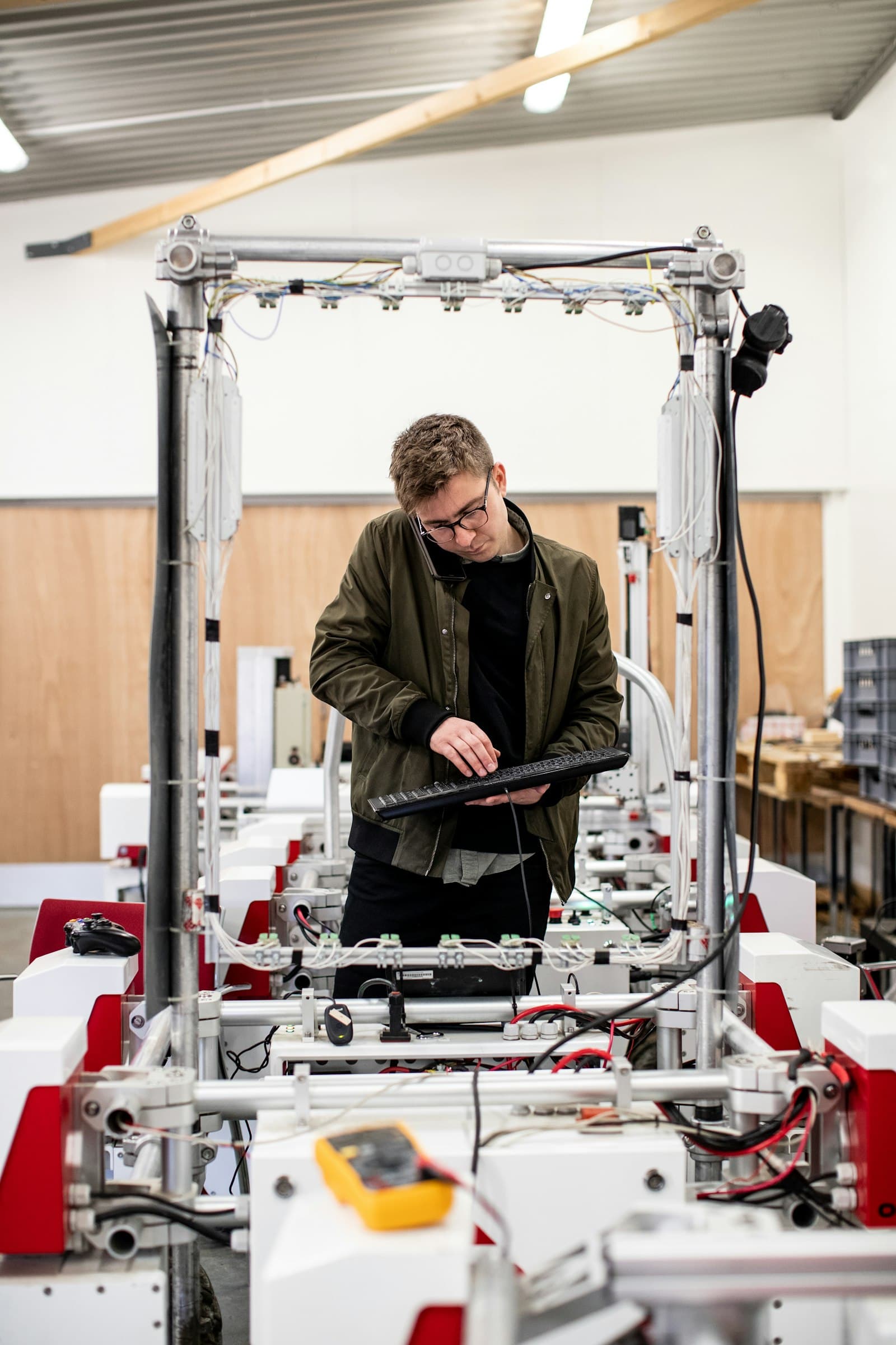 Operations team on a factory floor working alongside the systems Polymr connects